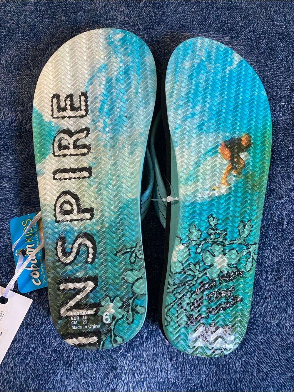 Cobian Kids Aqua Strap Black Floral Flip Flops